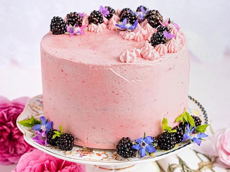 Vanilla layer cake with blackberry buttercream