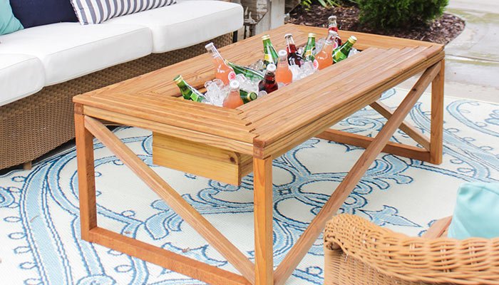 outdoor coffee table with a beverage cooler